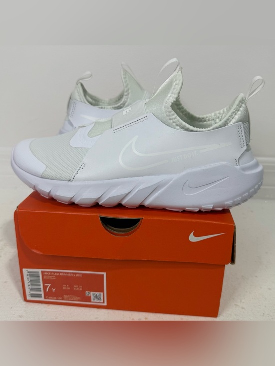 Nike Shoes - Nike White Slip-On Sneakers 8.5 women 7y men